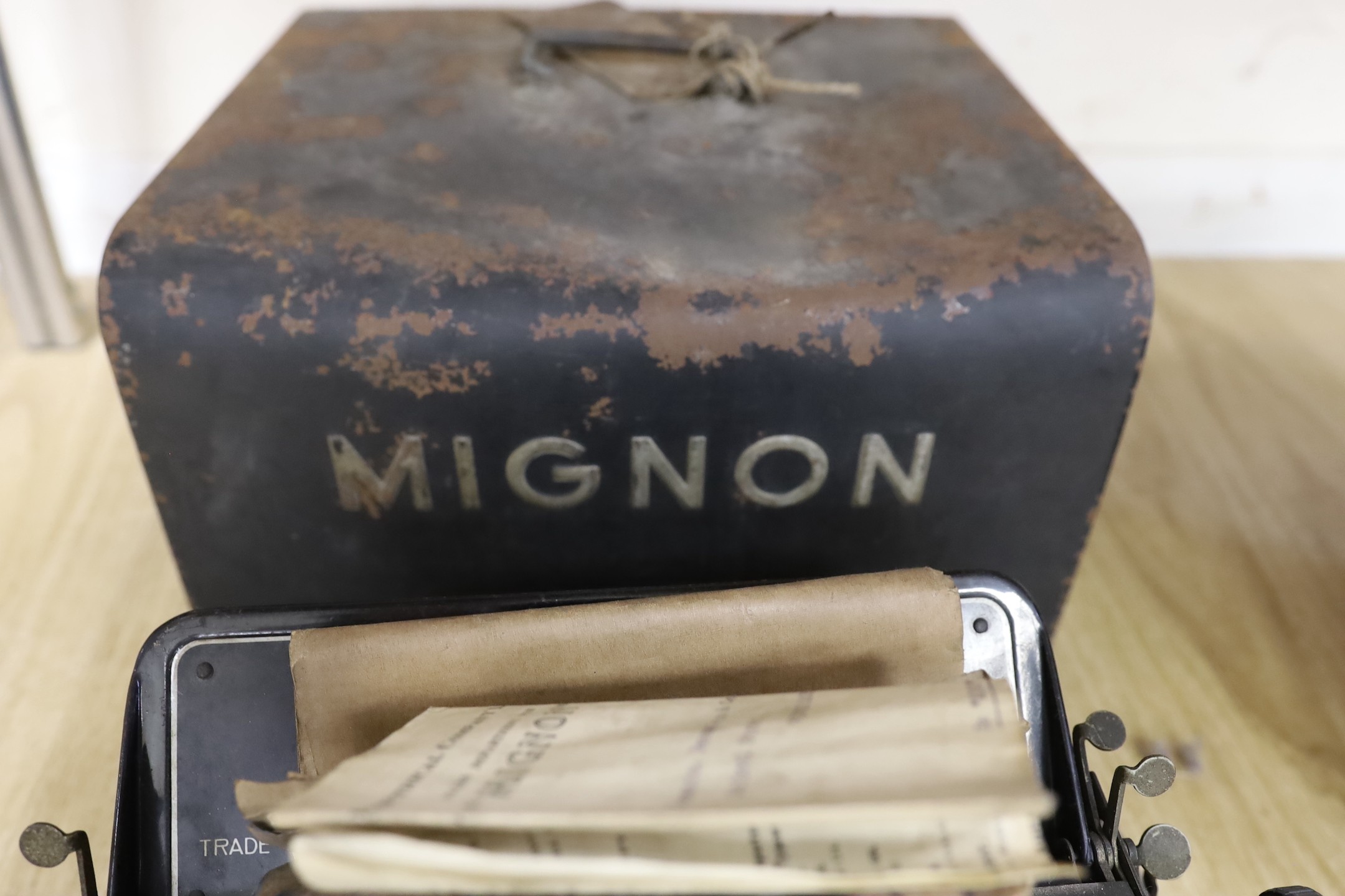 A vintage cased Mignon typewriter